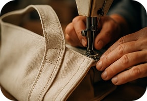 sewing machine stitches seams on bag